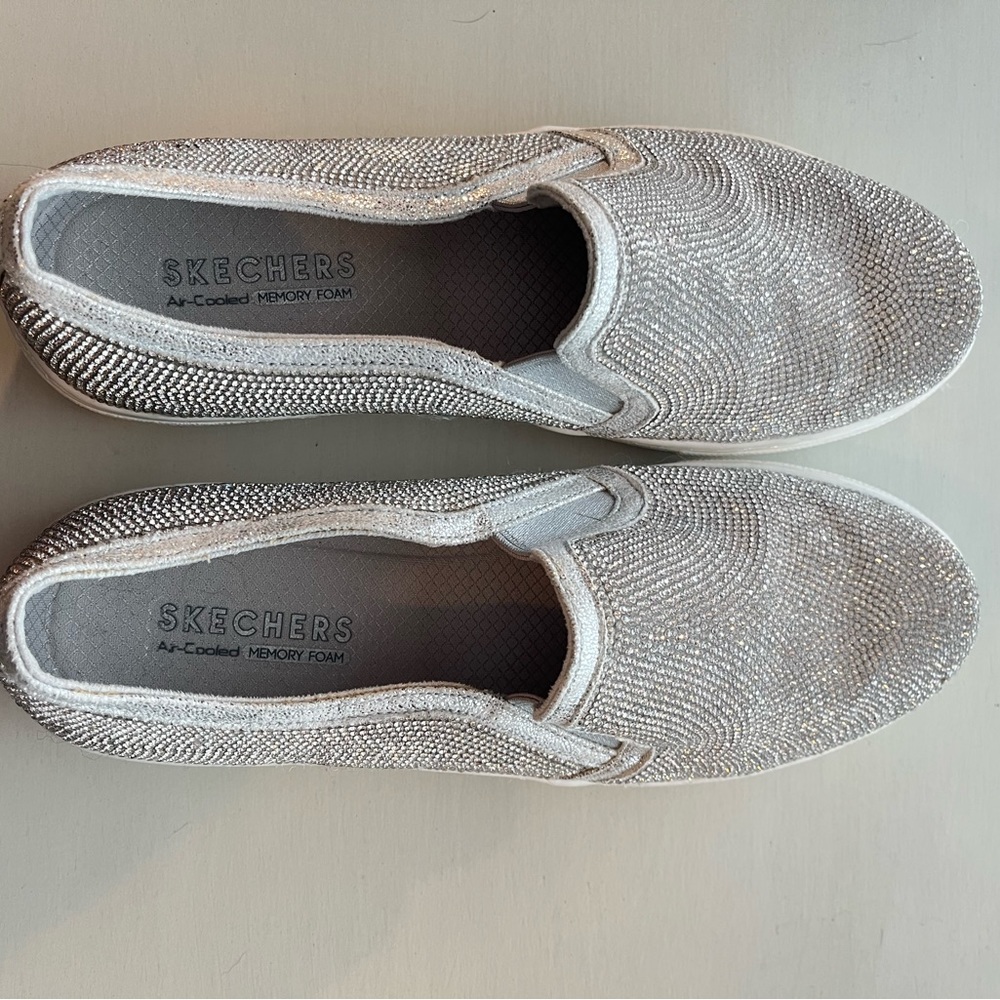 Sketchers with memory foam slip on shoe.  In good condition.